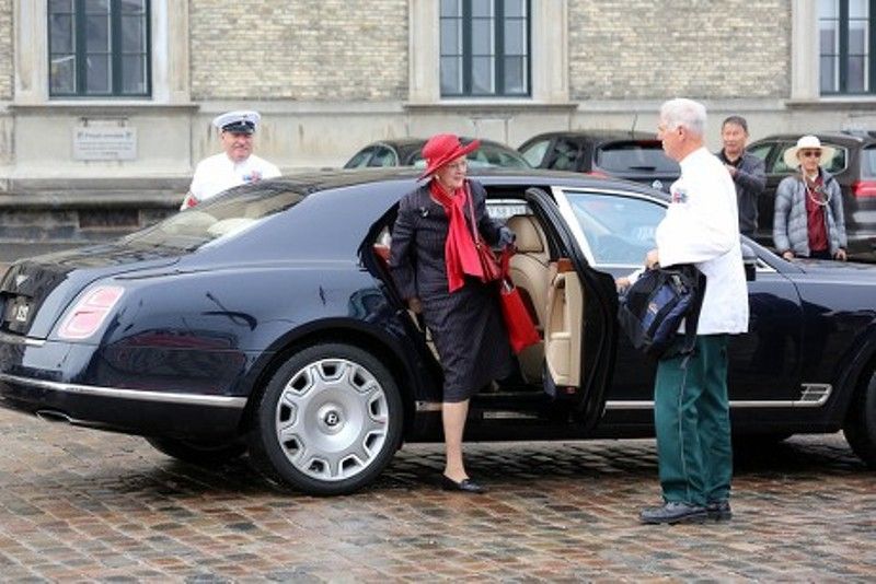 Margrethe coming out of her Bentley car