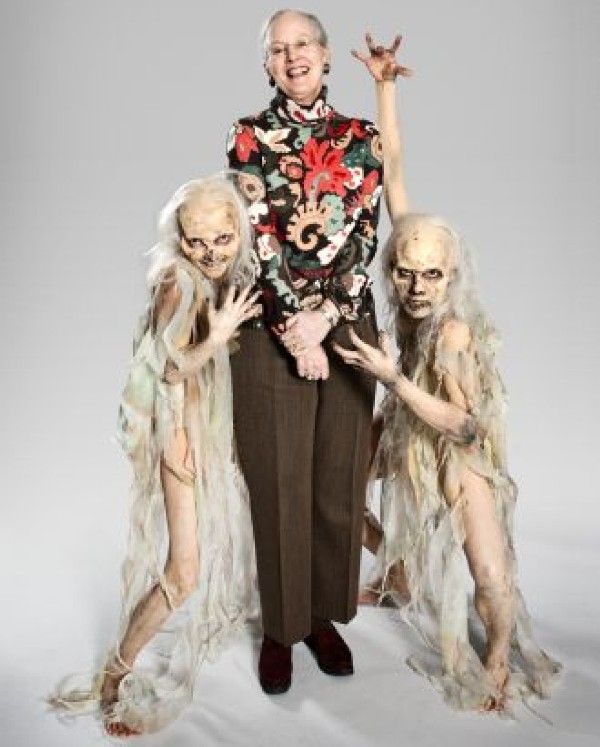 Margrethe with the kids wearing the costumes designed by her