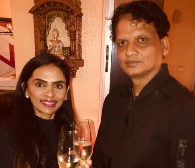 Meghana Dikshit celebrating New Year with her husband drinking champagne