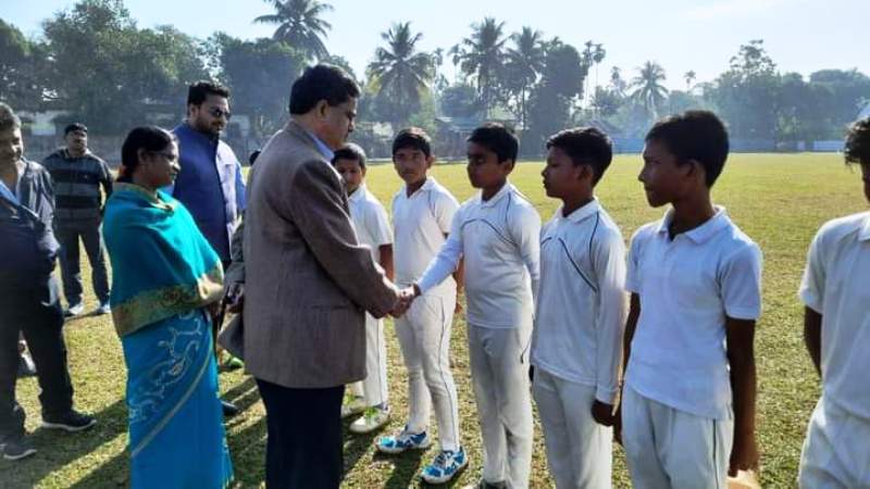 Manik Saha shaking hands with the U-14 Tripura national state's cricket team