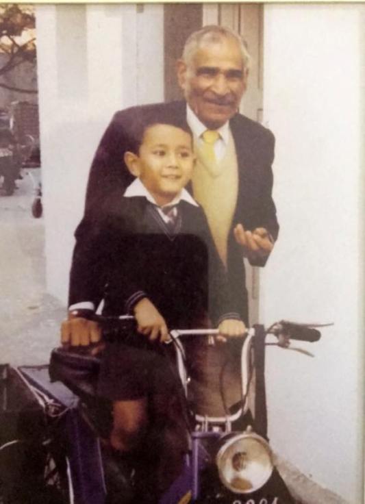 Sahil Anand childhood's picture with his grandfather