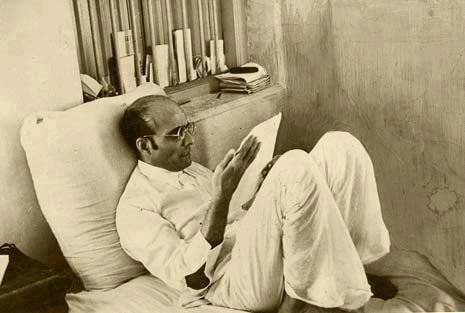 Vinayak Damodar Savarkar while reading a paper
