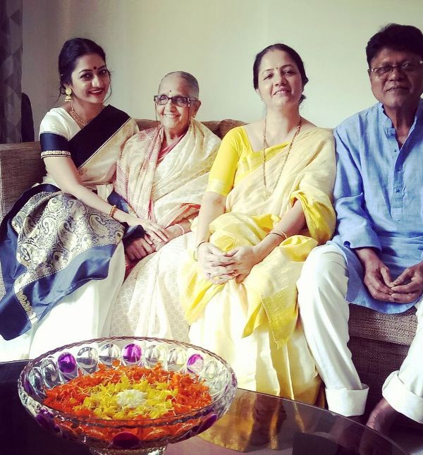 Vrushali with her parents and grandmother