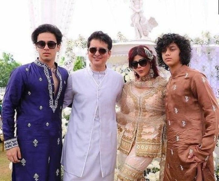 Warda Khan with her husband and sons