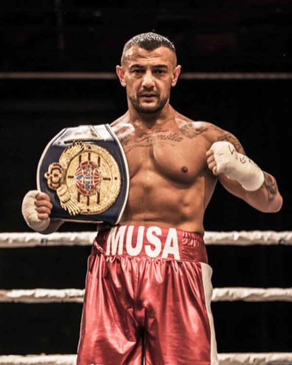 Musa Yamak with his World Boxing Federation belt