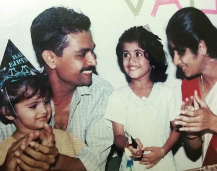 A childhood photo of Vagdevi with her parents and elder sister