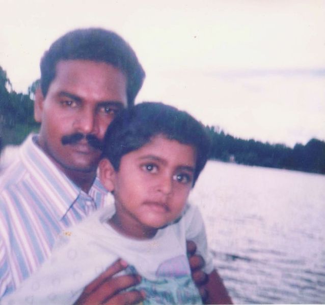 A childhood picture of Kathir with his father