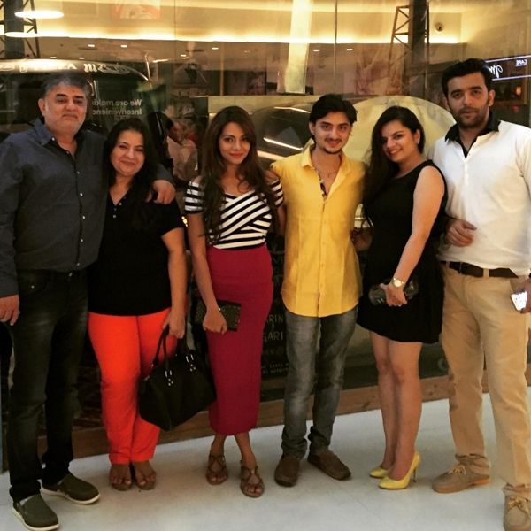 Aditya Kapadia with his parents, wife, sister, and brother-in-law