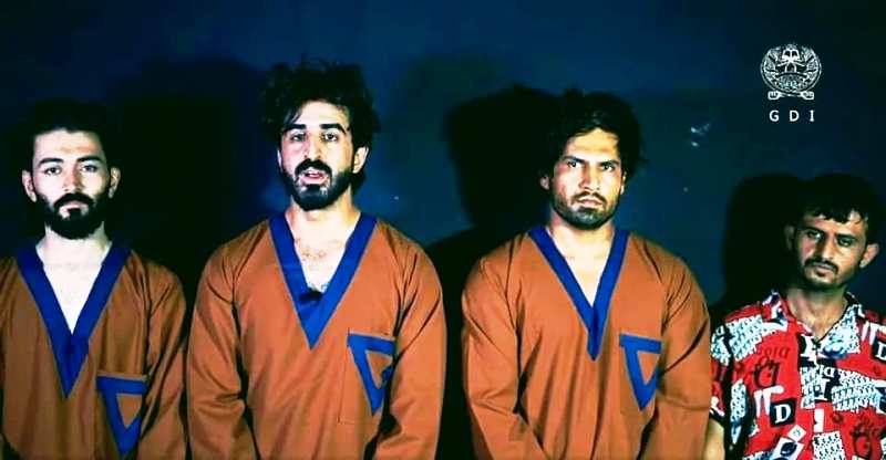 Ajmal Haqiqi and his friends, in the custody of the Taliban
