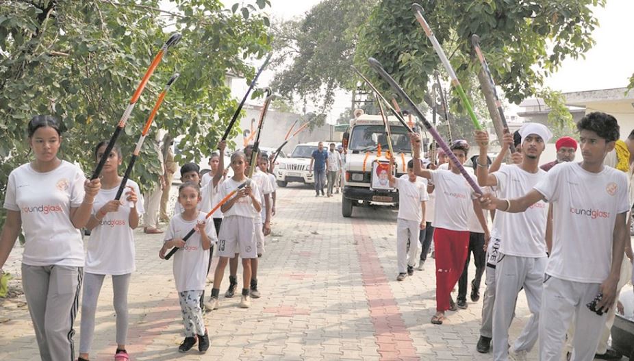 Budding Indian hockey players paying a tribute to Varinder Singh at cremation ground in his native village Dhannowali in Jalandhar