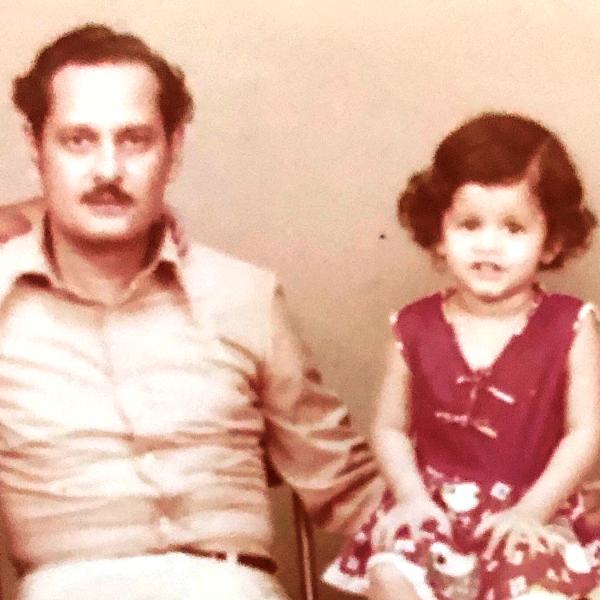 Childhood picture of Syeda Bushra Iqbal with her father