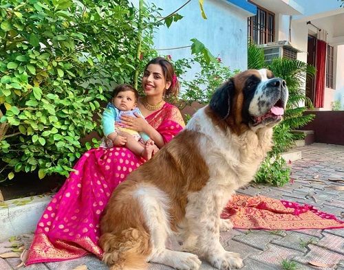 Divya Rai with her pet dog