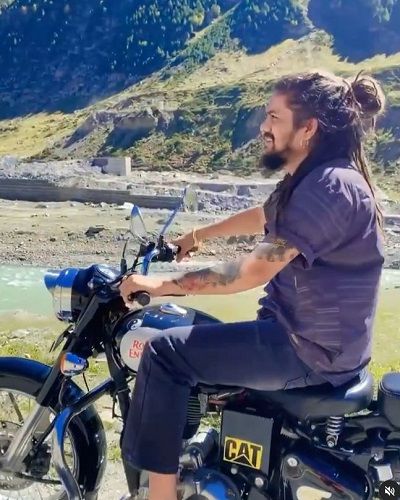 Hansraj Raghuwanshi riding his motorcycle