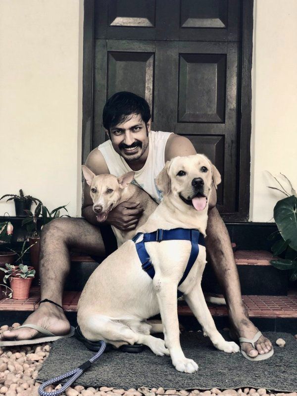 Harish Uthaman with his pet dog, Leo