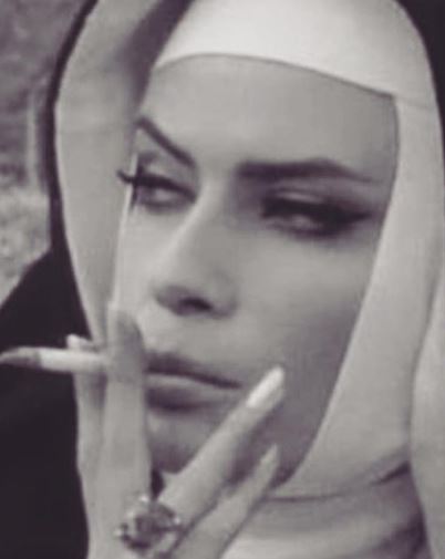 Kasia Gallanio smoking a cigarette