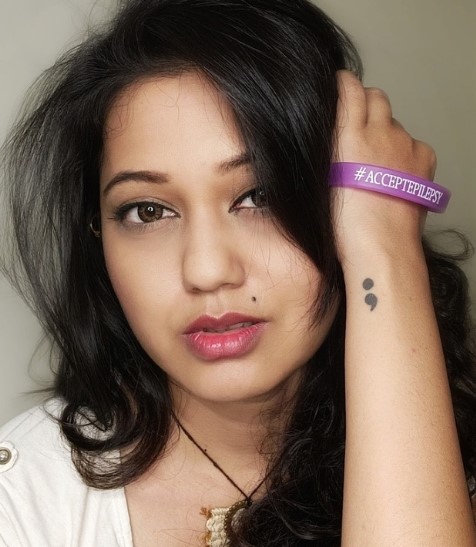 Ketaki featuring a tattoo on her wrist