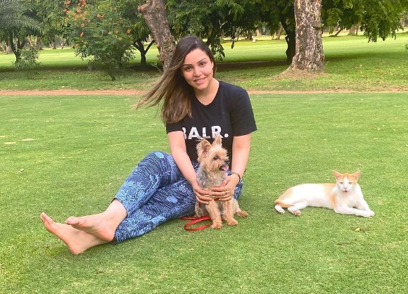 Kyra Dutt with her pet dog and cat