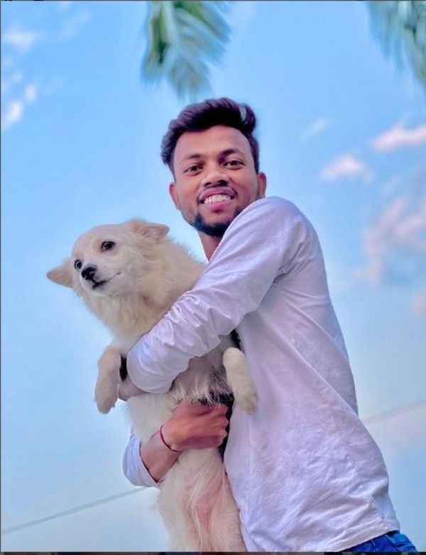 Manoj Dey with his pet dog