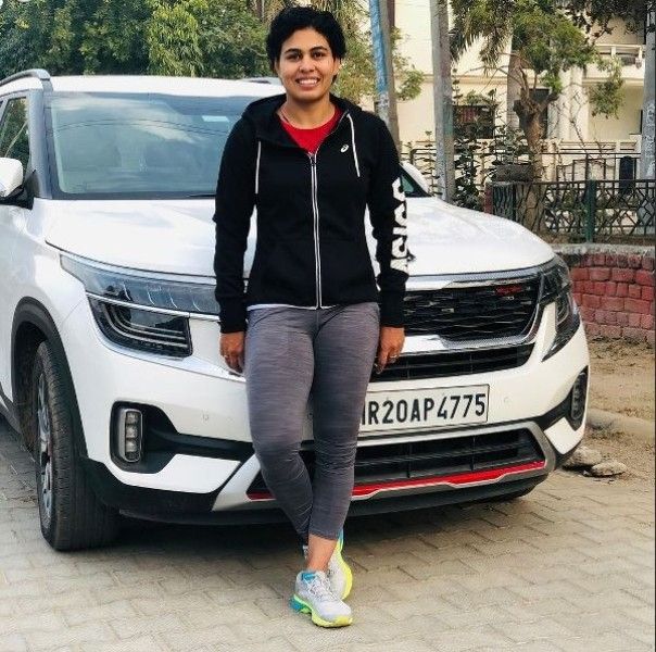 Pooja Dhanda with her car