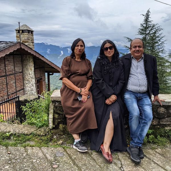 Priya Malik with her parents
