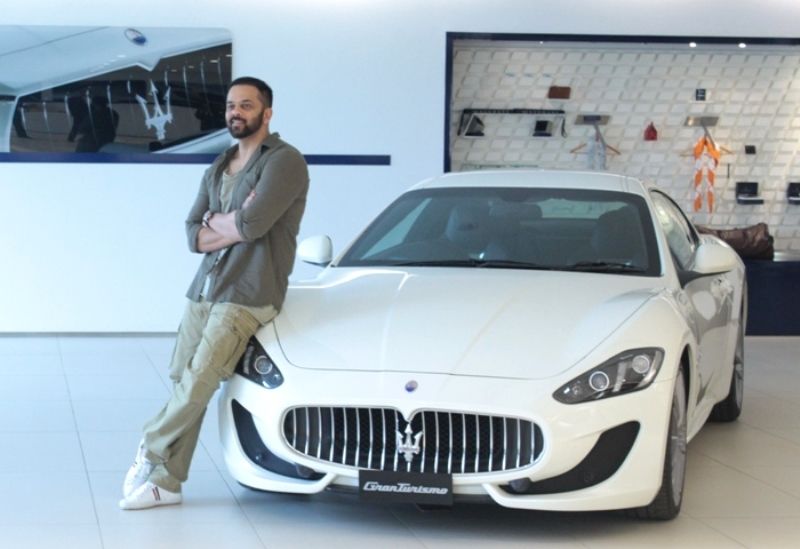 Rohit Shetty posing with his Maserati GT Sport 