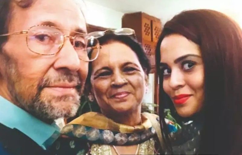 Sana Saeed with her parents