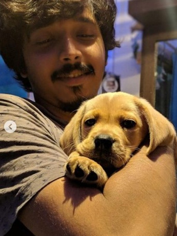 Shivraj Waichal with his pet dog Myra