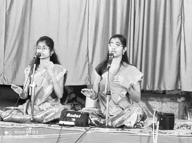 Vagdevi performing at a function along with her elder sister