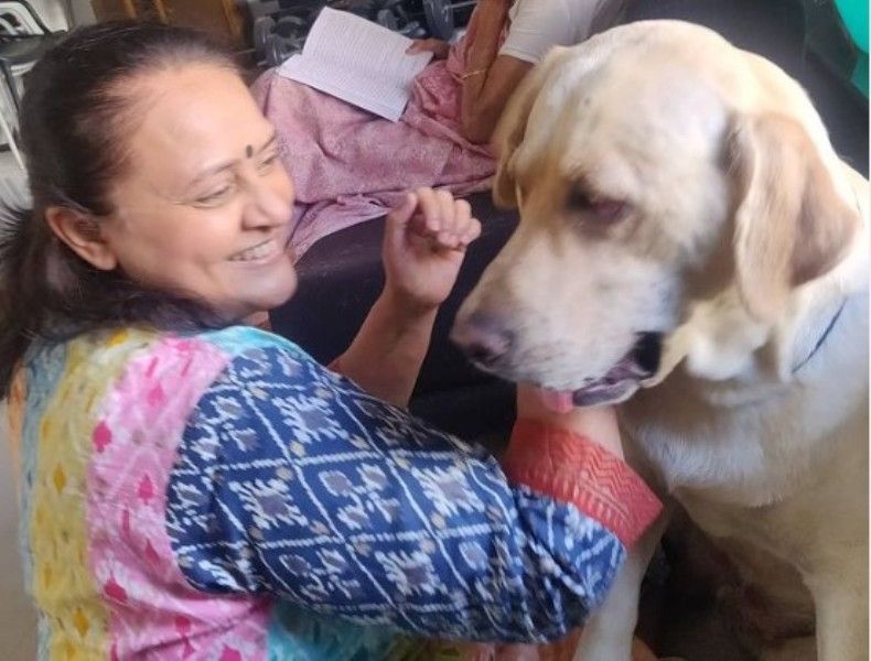Vandana Vithlani with her pet dog 
