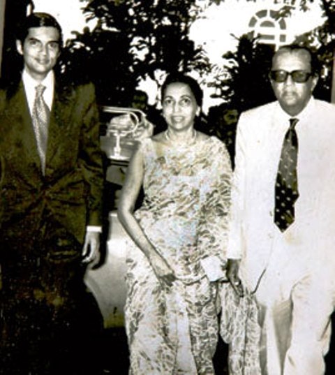 A black and white photograph of Ranil Wickremesinghe with his parents