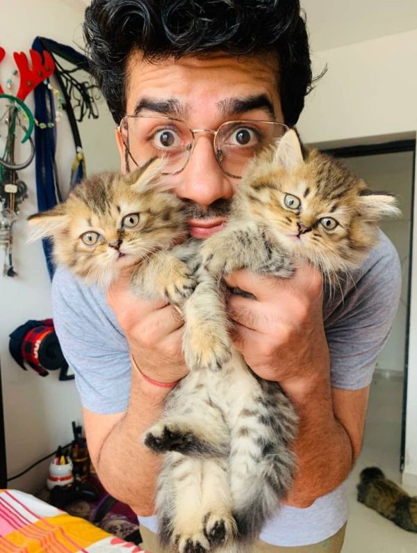 Aashish Mehrotra with his pet cats, Hichki and Ginee