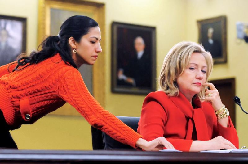 Abedin with Secretary of State Clinton during a House committee hearing in March 2011
