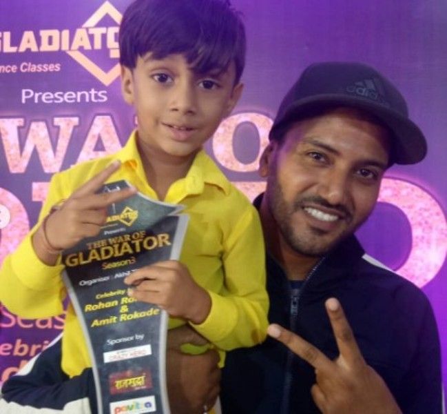 Aditya Patil with his trophy of The War of Gladiator dance competition
