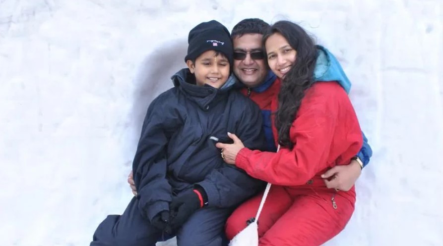 Ashish Chauhan with his wife and son