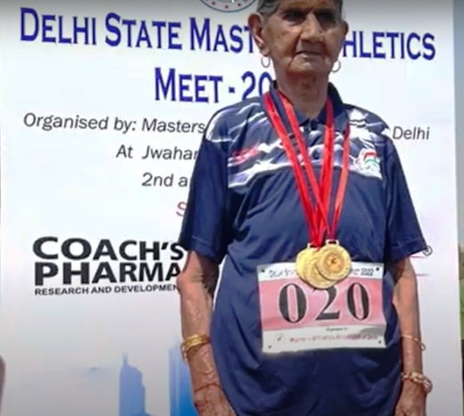 Bhagwani Devi with her three gold medals during the awarding ceremony at Delhi State Masters Athletics Meet