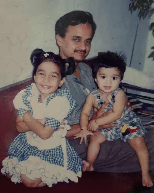 Childhood picture of Rupal Nand with her father and younger sister
