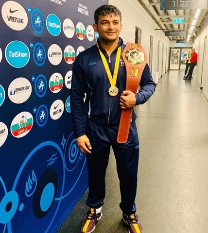 Deepak Punia after winning the gold medal and belt at the Asian Wrestling Championships