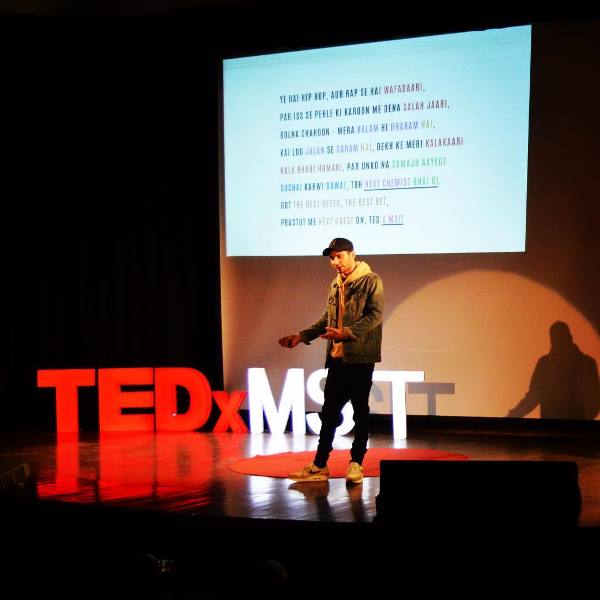 KR$NA on the stage of TEDx Talks
