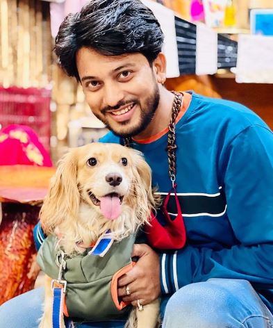 Kishor Das with his pet dog