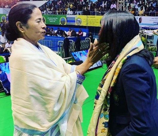 Mehuli Ghosh while receving a special sports award from Mamta Banerjee
