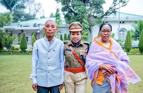 Mirabai Chanu with her parents after being appointed as Additional Superintendent of Police (Sports) by Manipur Chief Minister N Biren Singh in Imphal on 15 January 2022