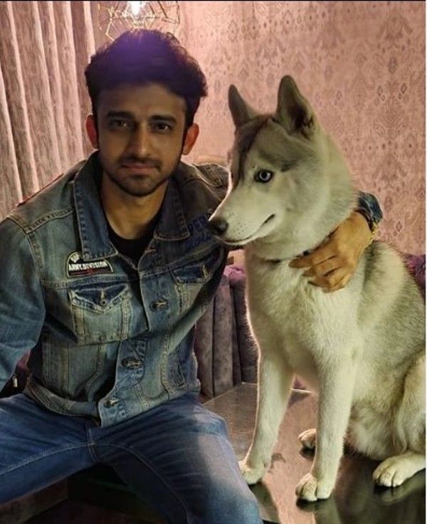 Romiit Raaj with his pet dog