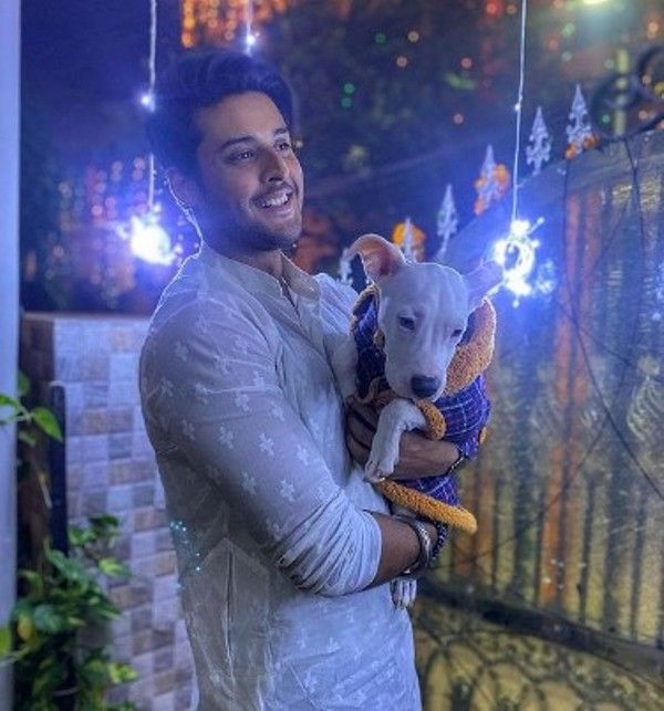 Shagun Pandey with his pet dog