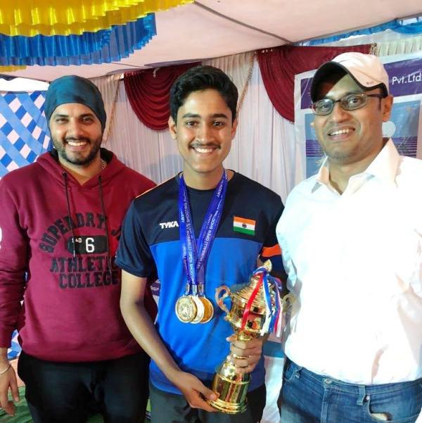 Shahu Tushar Mane with his medals and a trophy after winning the Hubballi Open Shooting Championship