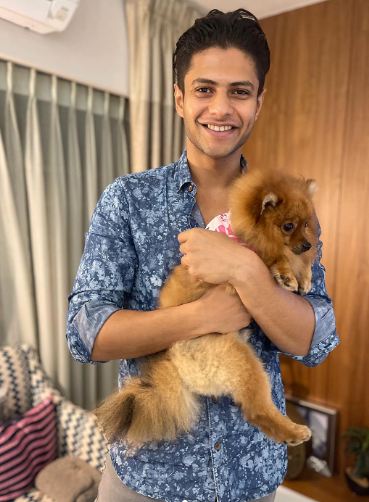 Shantanu Raje with a dog