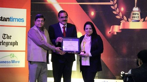 Shivani Sikri receiving IHPA award