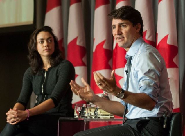 Shivon Zilis with Justin Trudeau during a press conference in Canada
