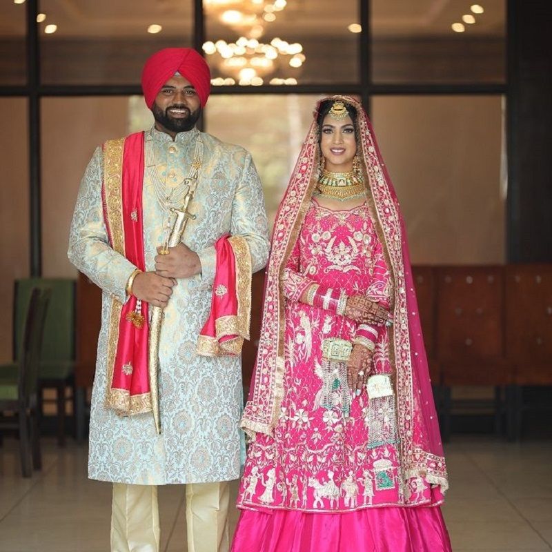 Tajinderpal Singh Toor with his wife on their wedding day