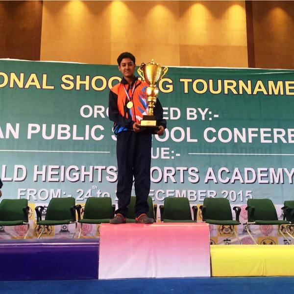 Tushar Mane with his trophy after winning the Zonal Shooting Tournament