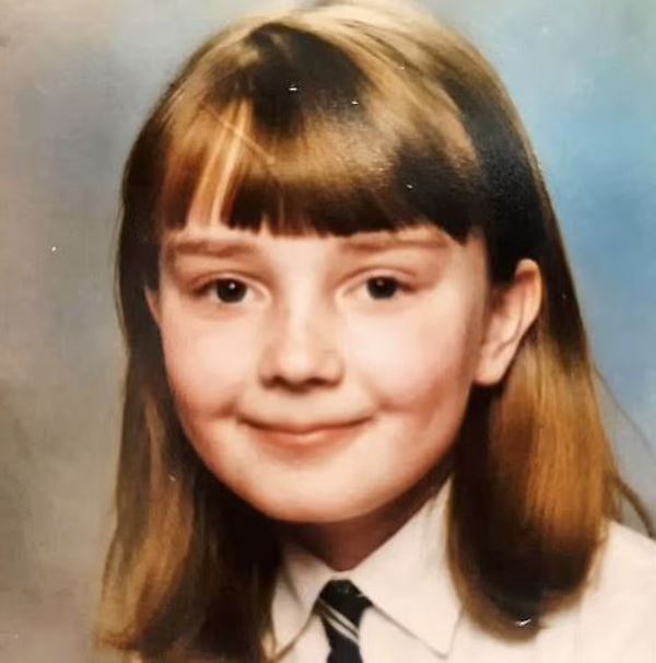 A childhood photo of Liz at the age of 12